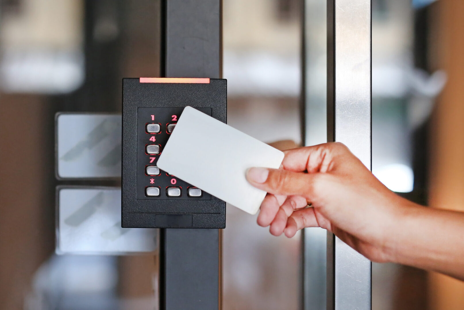 Image of someone using keycard access